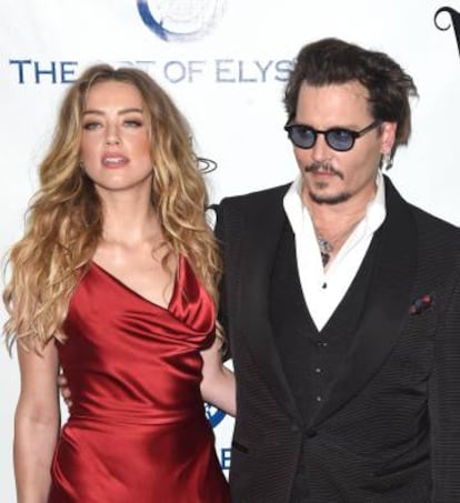 Amber Heard y Johnny Depp unos meses antes de su separación, en la gala The Art of Elysium celebrada en los Ángeles (enero de 2016).