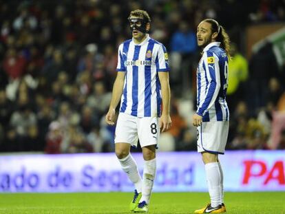 Stuani y Sergio García, ante el Athletic.