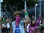 Feminist activists take part in a choreographed performance at the Venezuela square against gender violence and patriarchy in Caracas on December 6, 2019. Tens of women, performed "The rapist is you", the song of a feminist performace which emerged amid the social crisis in Chile and became viral around the world. (Photo by Ramses Mattey/NurPhoto)