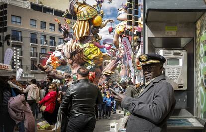 Streets are flooded with tourists and vendors during the fiestas.