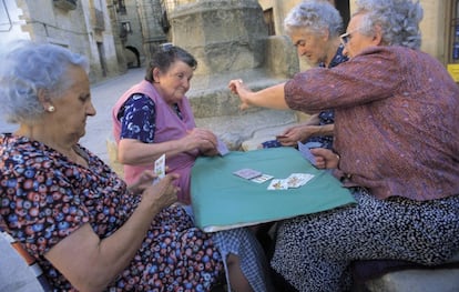 Women in a Spanish village enjoying some fresh air.