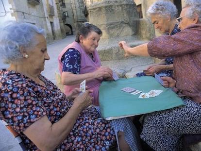 Women in a Spanish village enjoying some fresh air.