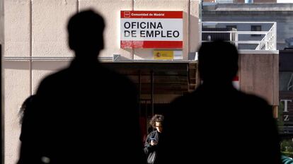 People outside an employment office in Madrid.