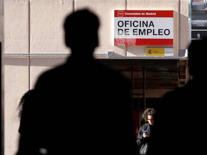 People outside an employment office in Madrid.