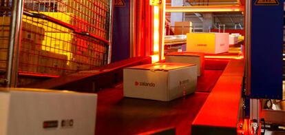 FILE PHOTO: Parcels of online mail order company Zalando on a conveyor at the parcel distribution centre of Swiss Post in Frauenfeld