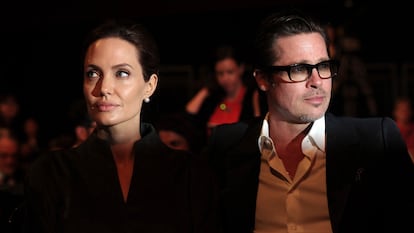 Actress and director Angelina Jolie and her then-husband, actor Brad Pitt, at a forum on sexual violence in June 2013.
