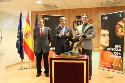 Román, Cardenal y Rivera, durante el acto.