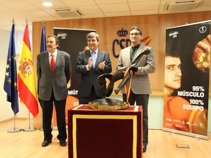 Román, Cardenal y Rivera, durante el acto.