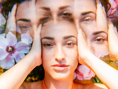 Multiple exposure of young woman with head in hands