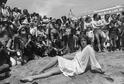 Sylvia Kristel poses on the beach in Cannes in 1977.