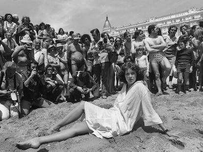 Sylvia Kristel poses on the beach in Cannes in 1977.