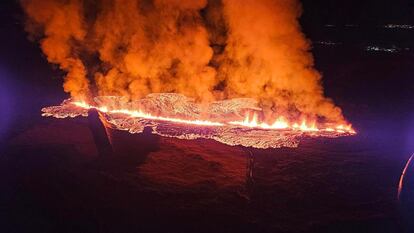 A volcano erupts in Reykjanes, Iceland, in a photo taken from a Coast Guard helicopter.