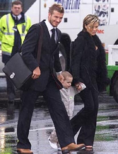 David Beckham y Victoria, con su hijo, el pasado año.