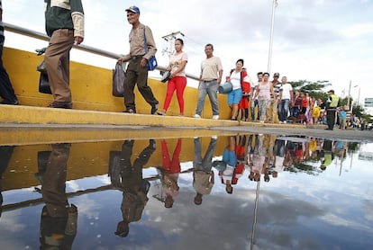 Venezuelans cross into Colombia to buy basic goods.