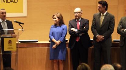 A la izquierda, José María Marín, presidente de la CNMC, en su toma de posesión.