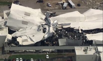 The roof of a Pfizer facility shows heavy damage after a tornado passed the area in Rocky Mount, North Carolina