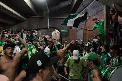 Fans of Atlético Nacional sing before the start of a match.
