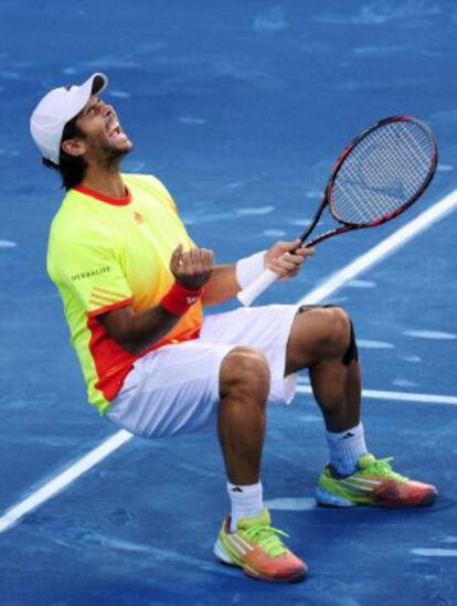 Fernando Verdasco celebrates winning against compatriot Rafael Nadal.