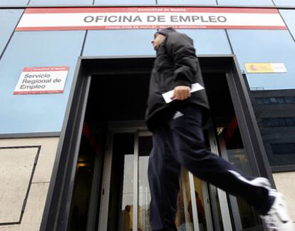 A man walks past an employment office in Madrid on Tuesday.