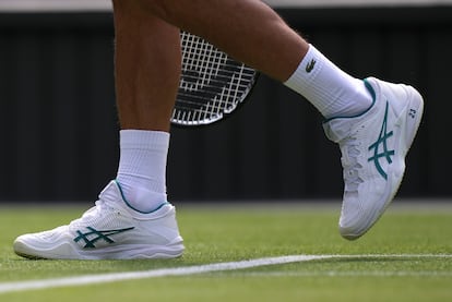 A detail on the shoes of Serbia's Novak Djokovic showing '23' in reference to the number of Grand Slam singles titles he has won, during his men's singles match against Poland's Hubert Hurkacz on day eight of the Wimbledon tennis championships in London, Monday, July 10, 2023.