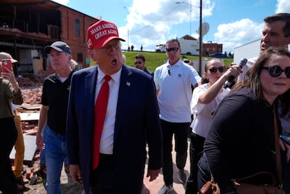 Former President Donald Trump visits areas affected by Hurricane Helene on Monday in Valdosta, Georgia.