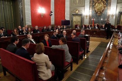 The 12 pro-independence leaders on trial at the Supreme Court. On the nearest bench (l-r): former regional justice chief Carles Mundó, former regional business chief Santiago Vila and the former regional head of governance and institutional relations, Meritxell Borrás. On the next bench (l-r): Jordi Cuixart, president of the civic association Ómnium Cultural , Carmen Forcadell, former speaker of the Catalan parliament, and Dolors Bassa, former chief of Labor, Social Affairs and Family. On the following bench (l-r): Jordi Sànchez, former president of the civic association Catalan National Assembly, Jordi Turull, former chief of presidential affairs and Josep Rull, former chief of territory and sustainability. On the furthest bench (l-r): Oriol Junqueras, the former deputy premier of Catalonia, Raül Romeva, former chief of foreign affairs, and Joaquim Forn, former regional interior chief.