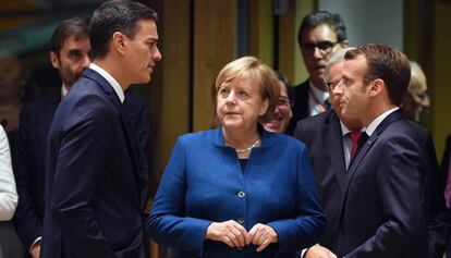 Sánchez, Merkel y Macron, en octubre pasado.