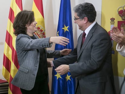 La vicepresidenta del Govern, Soraya Sáenz de Santamaria, i Enric Millo.