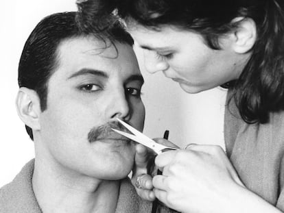 1982:  Rock singer Freddie Mercury (Frederick Bulsara, 1946 - 1991), of the popular British group Queen, has his moustache groomed.  (Photo by Steve Wood/Express/Getty Images)