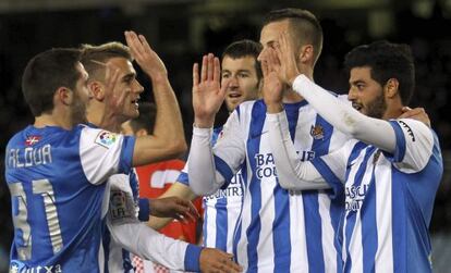 Los jugadores de la Real celebran un gol esta temporada.