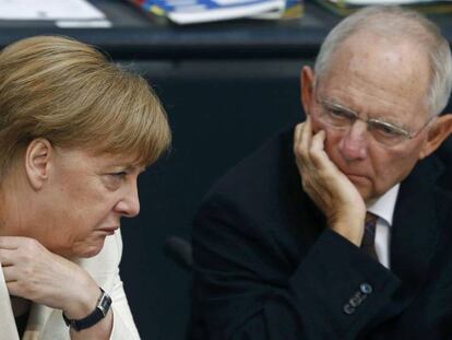 Merkel y su ministro de Finanzas, Wolfgang Schauble.