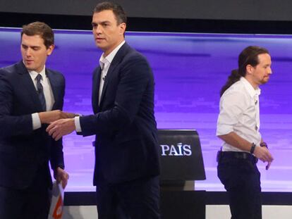 Rivera, Sánchez e Iglesias, durante el debate organizado por EL PAÍS