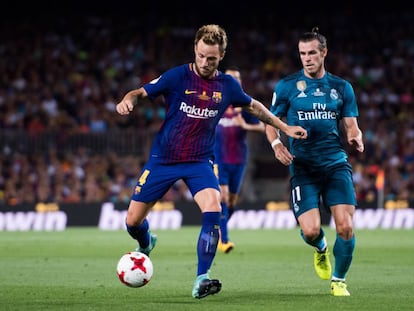 Ivan Rakitic y Gareth Bale durante el partido de ida.