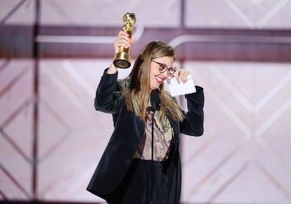 Justine Triet accepts the award for Best Screenplay  Motion Picture for "Anatomy of a Fall" at the 81st Golden Globe Awards