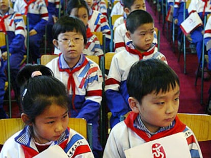 Escolares chinos se preparan para ser voluntarios en el 2008