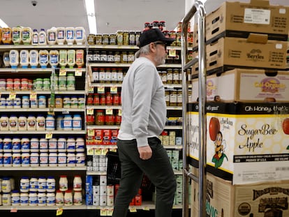 A shopper walks down an aisle at an Albertsons grocery store in Los Angeles, California, USA, 26 February 2024.