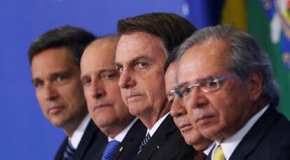 Jair Bolsonaro, Hamilton Mourão e Paulo Guedes em evento nesta quarta-feira. 