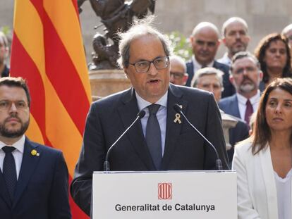 Catalan premier Quim Torra and aides observing the referendum anniversary.