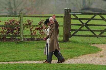 Britain's King Charles and Queen Camilla greet as they walk after attending a church service, at St. Mary Magdalene's church on the Sandringham estate in eastern England, Britain, February 11, 2024.