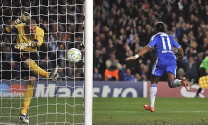 Didier Drogba wheels away in delight after scoring at Stamford Bridge.
