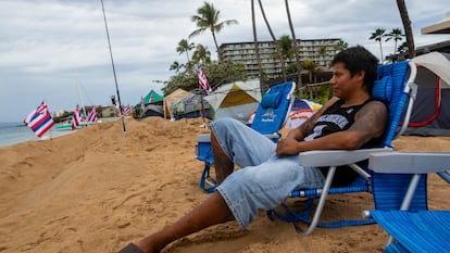 Carlos Lamas looks out to the sea from his spot at the "Fish-in" protest on, Friday, Dec. 1, 2023, in Lahaina, Hawaii.