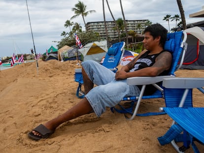 Carlos Lamas looks out to the sea from his spot at the "Fish-in" protest on, Friday, Dec. 1, 2023, in Lahaina, Hawaii.