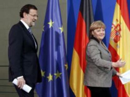 Mariano Rajoy, junto a Angela Merkel.