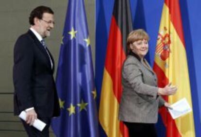 Mariano Rajoy, junto a Angela Merkel.