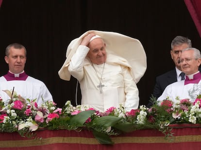 Pope Francis smiles from the central balcony of the St. Peter's Basilica prior to the 'Urbi et Orbi' (To the city and to the world) blessing, at the Vatican, Sunday, March 31, 2024.