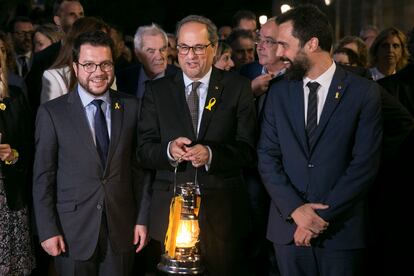 El presidente de la Generalitat, Quim Torra, junto a Pere Aragonès, vicepresidente catalán, y Roger Torrent, presidente del Parlament, en 2018. 