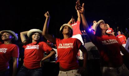 Women dance Tuesday at a concert dedicated to Ch&aacute;vez.