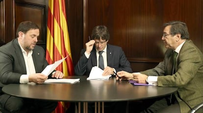 Junqueras, Puigdemont y un secretario del Tribunal Superior de Cataluña.
