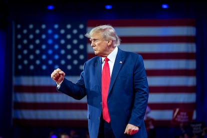 Former President Donald Trump pumps his fist as he departs after speaking at the Conservative Political Action Conference on March 4, 2023, at National Harbor in Oxon Hill, Maryland.