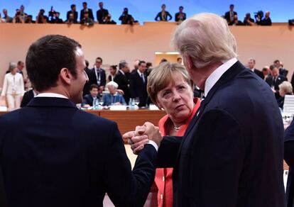 Donald Trump, Emmanuel Macron y Angela Merkel en la reciente reuni&oacute;n del G20 en Hamburgo.